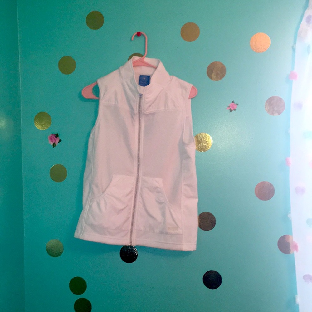 Charles River Apparel white vest with pockets.